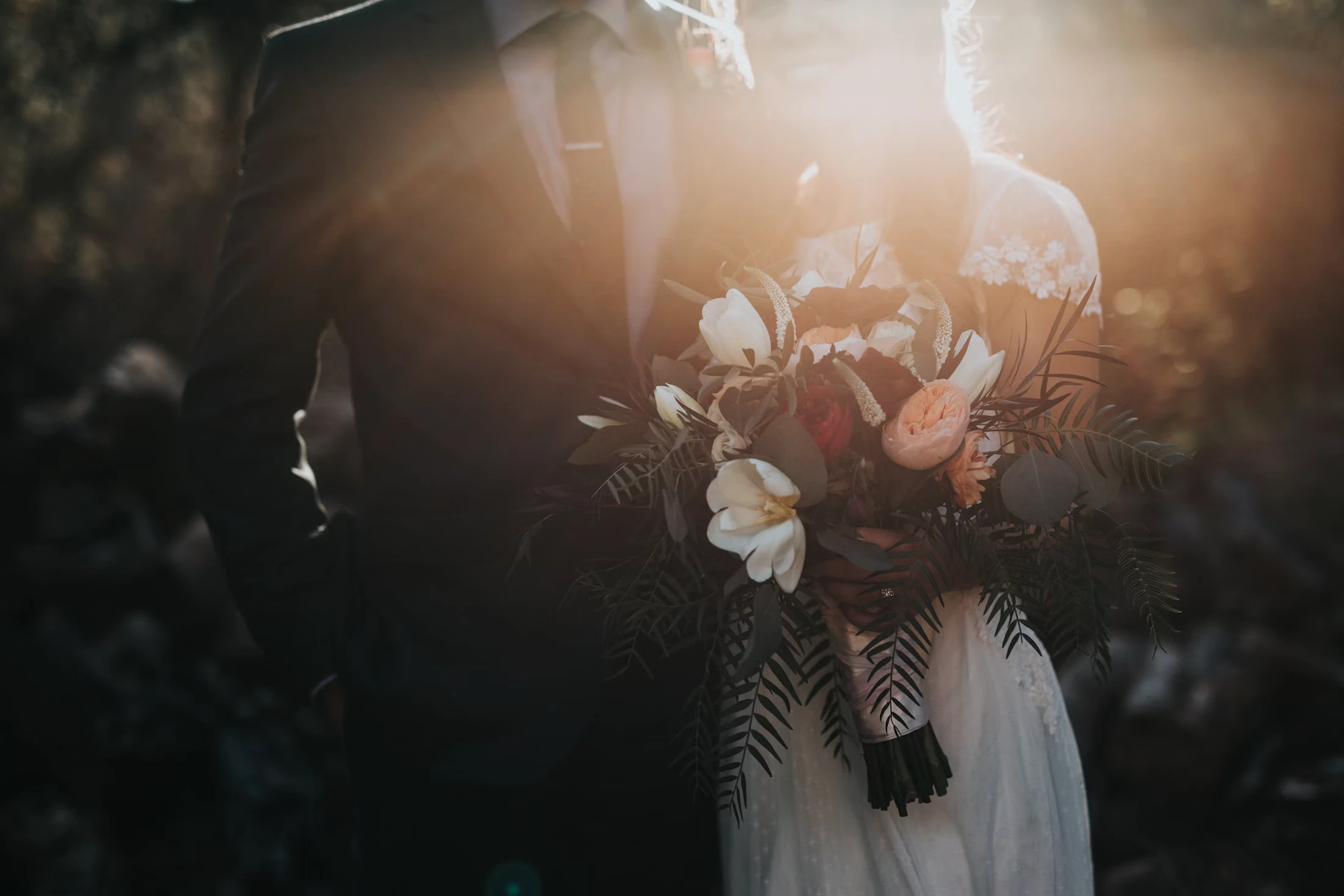 Wedding table arranged with flowers and candles